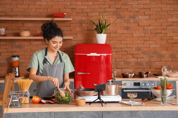 Young Woman Making Salad While Video Tutorial Kitchen —  Fotos de Stock