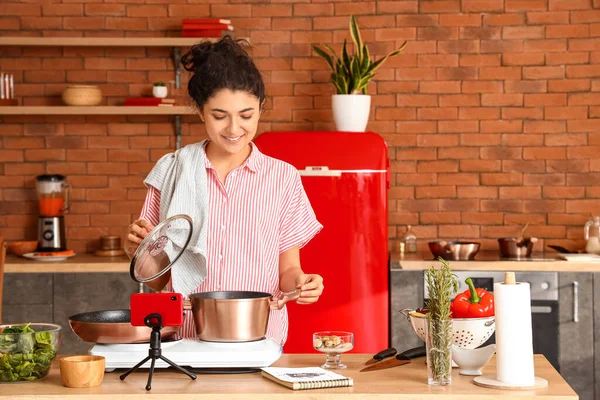 Young Woman Cooking Pot Video Tutorial Kitchen —  Fotos de Stock