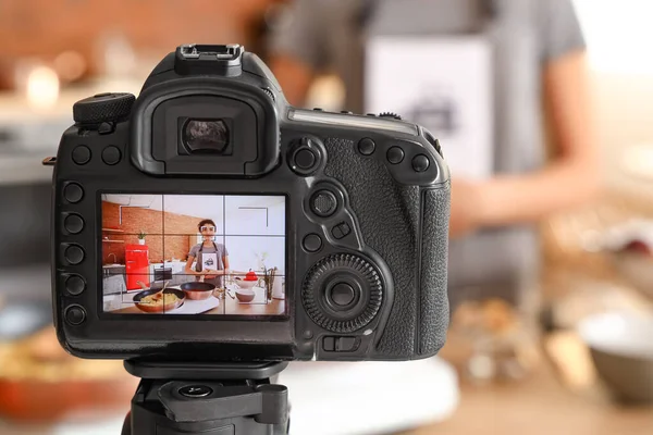 Young Woman Cooking Book Display Photo Camera Kitchen — Stock fotografie