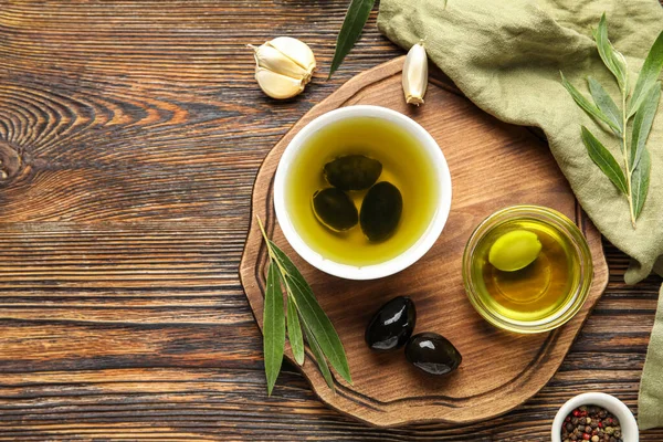 Composition Bowls Oil Olives Wooden Background — Foto de Stock