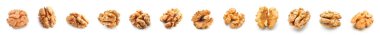 Set of tasty peeled walnuts isolated on white