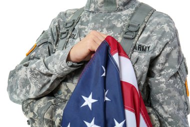 Mature female soldier with USA flag on white background, closeup