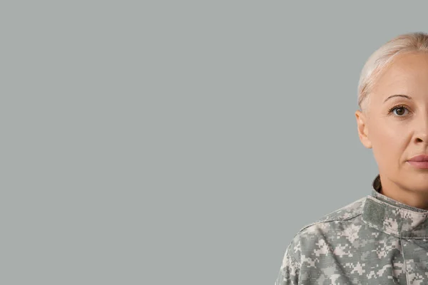 Mature Female Soldier Grey Background — Foto de Stock