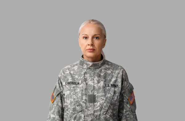 Mature Female Soldier Grey Background — Stock Photo, Image