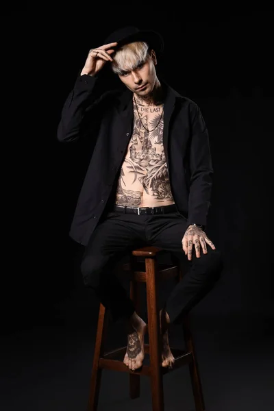 Young Tattooed Man Sitting Stool Black Background — Stock Photo, Image