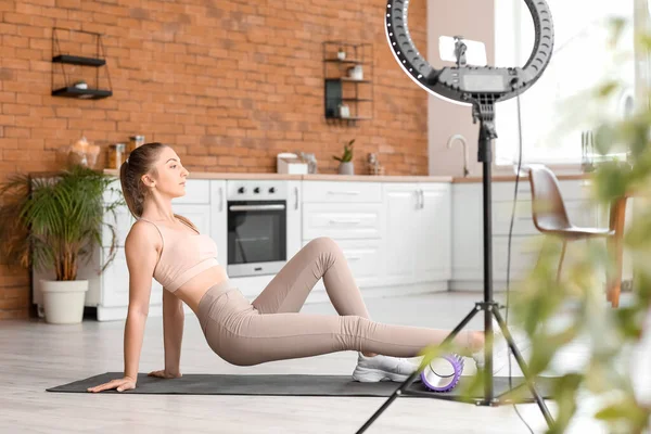 Young Woman Foam Roller Recording Video Kitchen — 图库照片