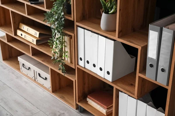 Wooden Shelving Unit Folders Houseplants Green Wall — Stock Photo, Image