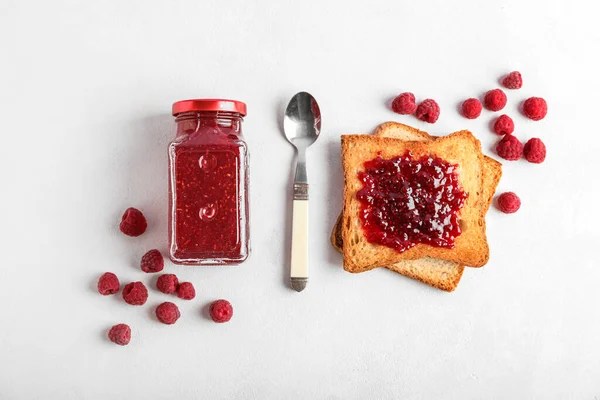 Tasty Toasts Raspberries Jar Jam Spoon White Background — Foto de Stock