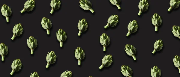 Many Green Artichokes Black Background — Zdjęcie stockowe