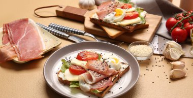 Plate with fresh tasty bruschetta on table
