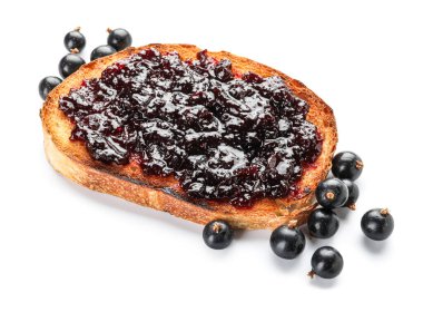 Toast with delicious black currant jam on white background