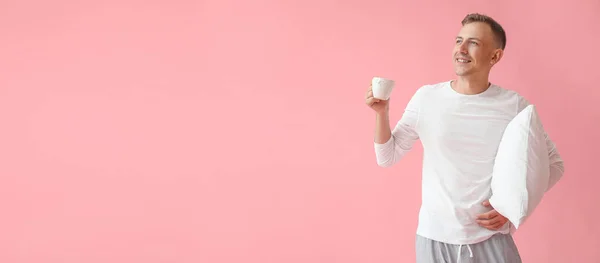 Young Man Pillow Drinking Coffee Pink Background Space Text — Photo