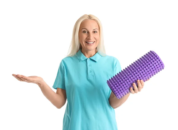 Mature Physiotherapist Foam Roller Showing Something White Background — Stock fotografie