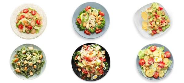 Set Plates Tasty Caesar Salad White Background Top View — Zdjęcie stockowe