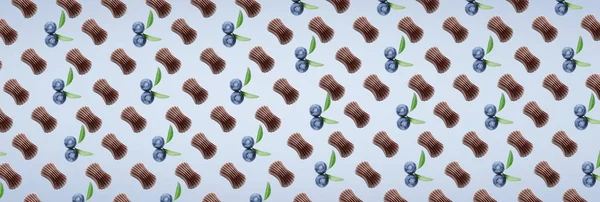 Many Tasty Chocolate Candies Berries Light Blue Background Pattern Design — 스톡 사진