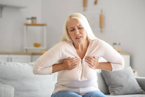 Mature Woman Suffering Breast Pain Kitchen — Foto Stock