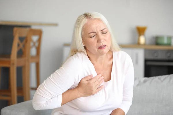 Mature Woman Suffering Breast Pain Kitchen — Stok fotoğraf