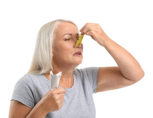 Ill Mature Woman Clothespin Tissue White Background Stuffy Nose Concept — Stock Photo, Image