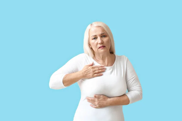 Mature Woman Suffering Breast Pain Blue Background — Stock Fotó