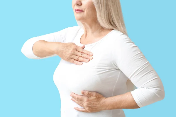 Mature Woman Suffering Breast Pain Blue Background — Stock Photo, Image