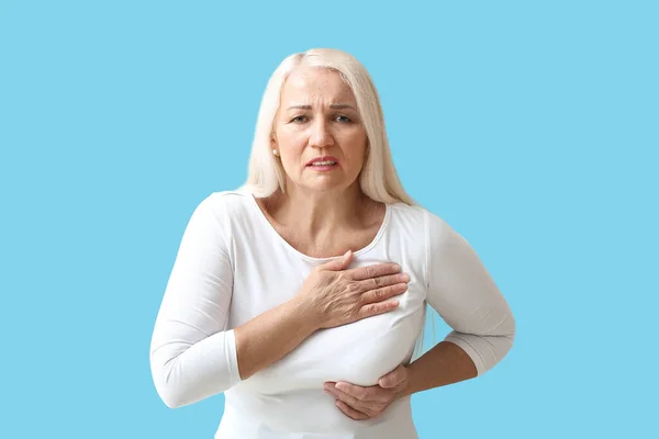 Mature Woman Suffering Breast Pain Blue Background — Stock Photo, Image