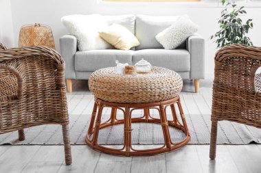 Rattan table with cookies in cozy living room