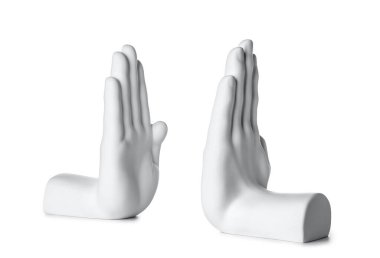Bookend in shape of hands on white background