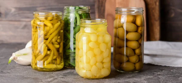 Jars Different Canned Vegetables Grunge Background — Stock Photo, Image