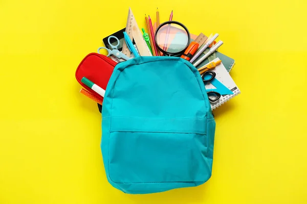 School Backpack Stationery Supplies Yellow Background — Stock Photo, Image