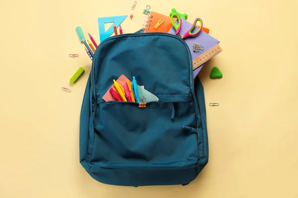 Blue Backpack School Stationery Beige Background — 스톡 사진