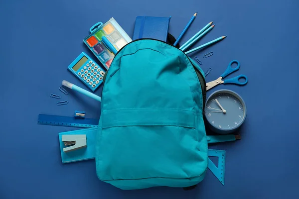 School Backpack Stationery Blue Background — Zdjęcie stockowe