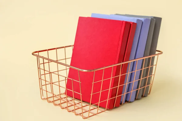 Metal Basket Books Beige Background — Stock fotografie