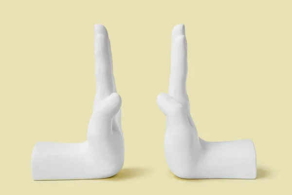 Bookend Shape Hands Beige Background — 스톡 사진