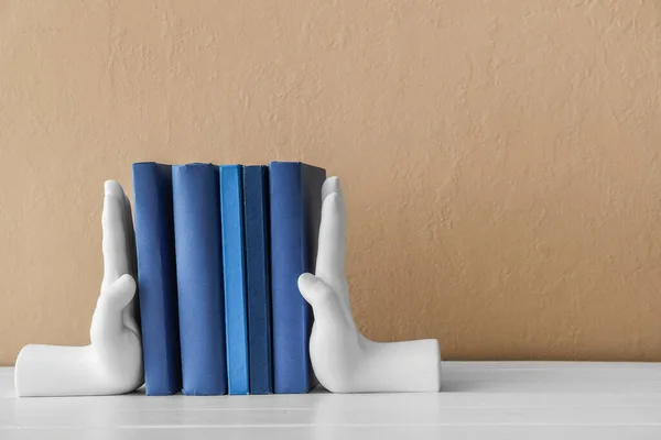Stylish Holder Books Table Beige Wall — Stock Photo, Image