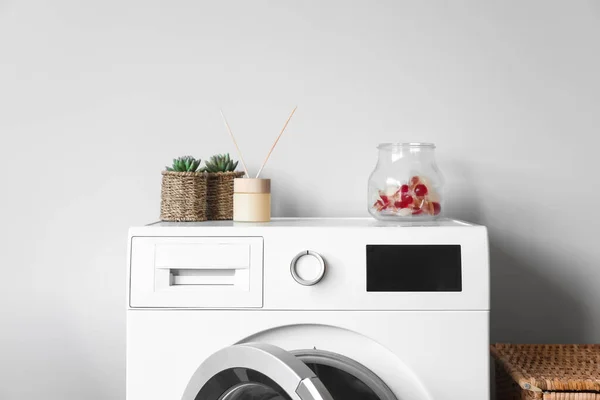 Washing Machine Jar Capsules Reed Diffuser Houseplants Light Wall — Stock Photo, Image