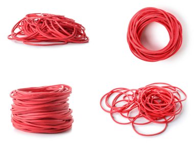 Set of red elastic bands on white background