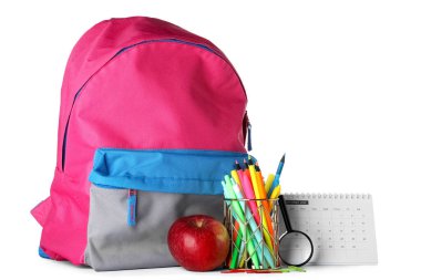 Pen cup with apple, calendar and school backpack on white background