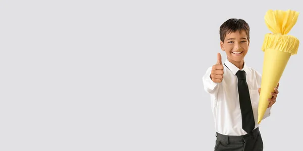 Happy Little Boy School Cone Showing Thumb Gesture Light Background — Foto de Stock