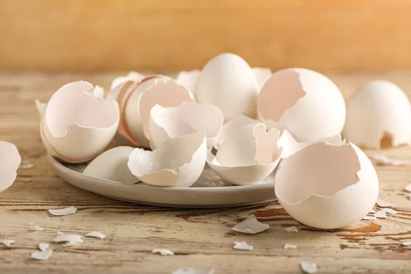 Plate Broken Egg Shells Light Wooden Background — Photo