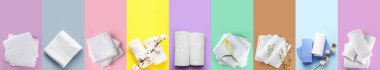 Set of clean towels on colorful background, top view