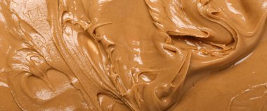 Texture of nut butter as background, closeup