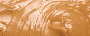 Texture of nut butter as background, closeup