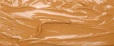 Texture of nut butter as background, closeup