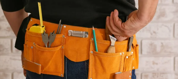 Male Carpenter Tools Belt Closeup — Stock fotografie