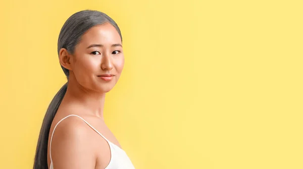 Asian Woman Graying Hair Yellow Background Space Text — Stock Photo, Image