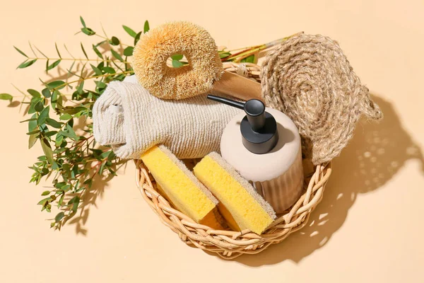 Wicker Basket Set Cleaning Supplies Eucalyptus Branches Color Background — Stock Photo, Image