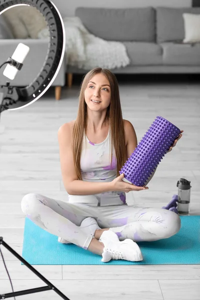 Young Woman Foam Roller Recording Video Home — Foto Stock
