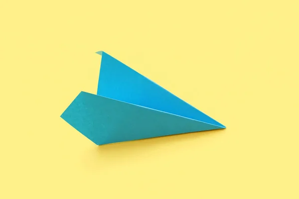 Blue Paper Plane Yellow Background — 스톡 사진