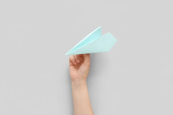 Woman Blue Paper Plane Grey Background — Stock Photo, Image