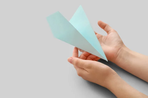 Woman Blue Paper Plane Grey Background — Stock Photo, Image